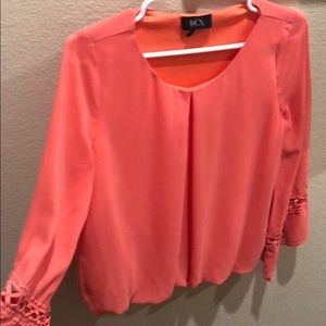 Salmon colored blouse